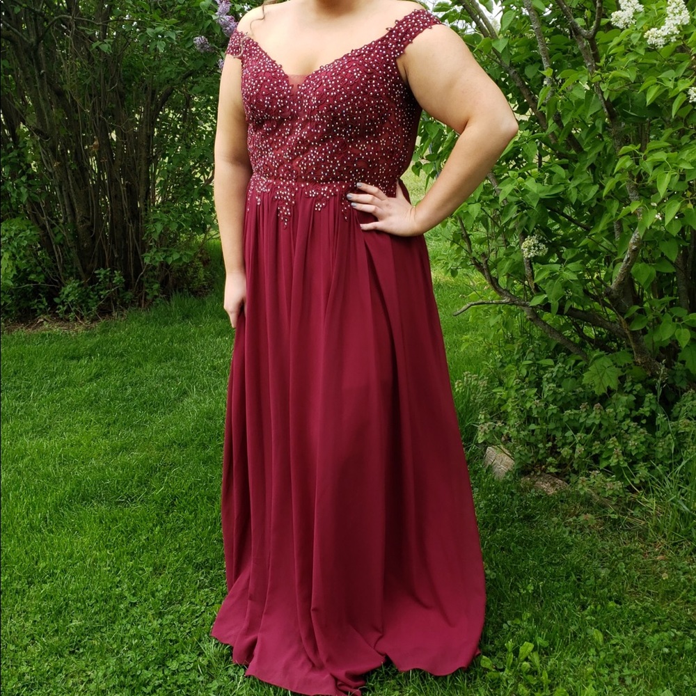 Blondie Nights maroon of the shoulder prom dress